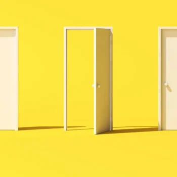 two closed doors and one open door on yellow background