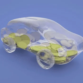 glass car piggy bank with savings inside of clear piggy bank