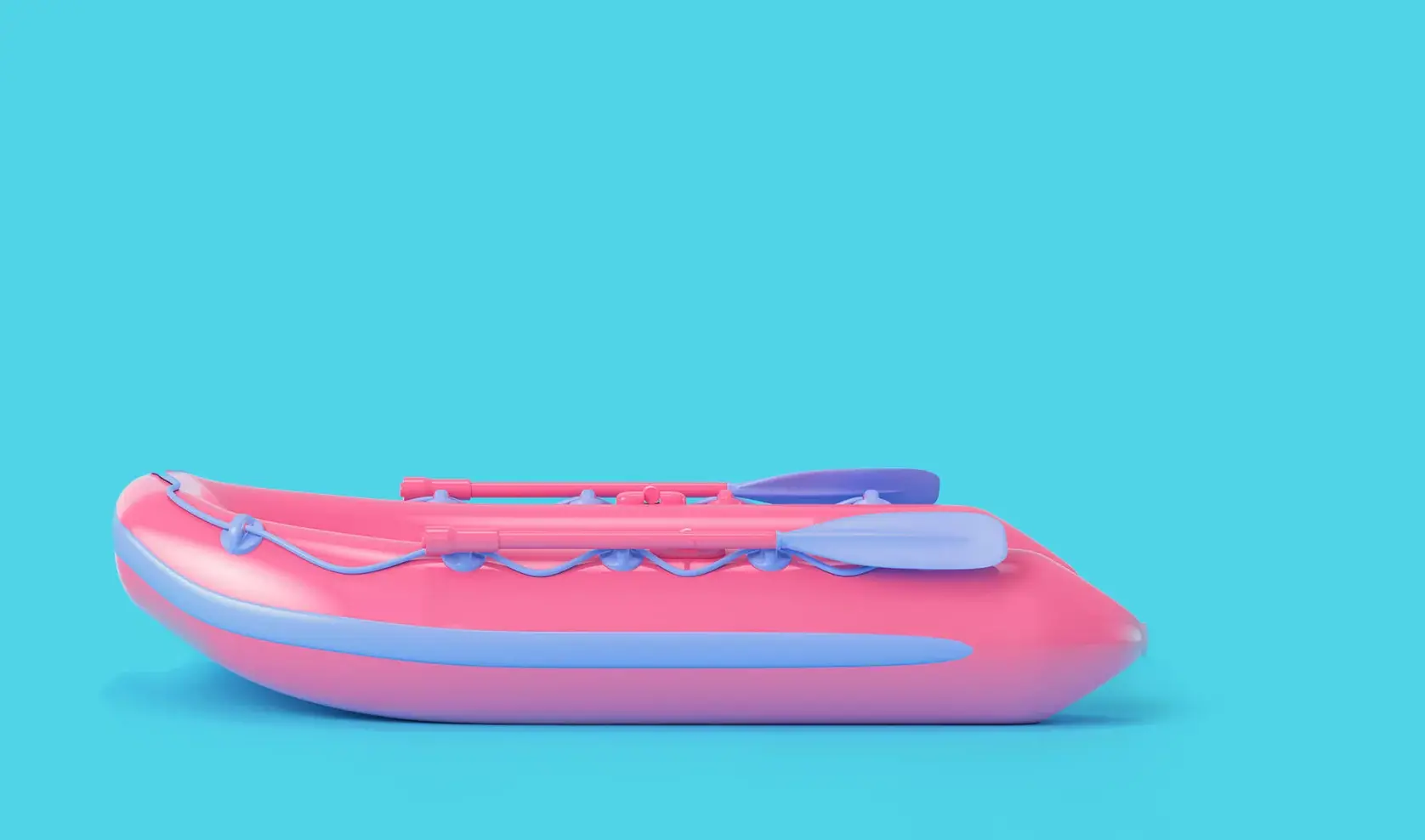 Inflatable pink boat on blue background.