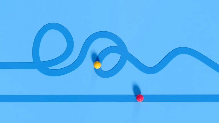 two balls on blue background going in different path patterns
