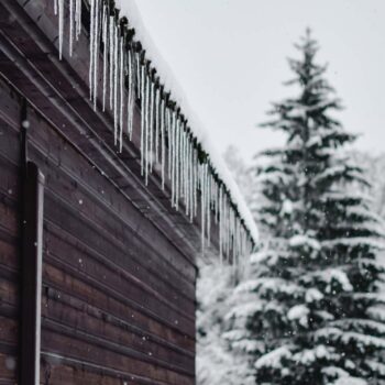 Brown Wooden Fence Covered With Snow