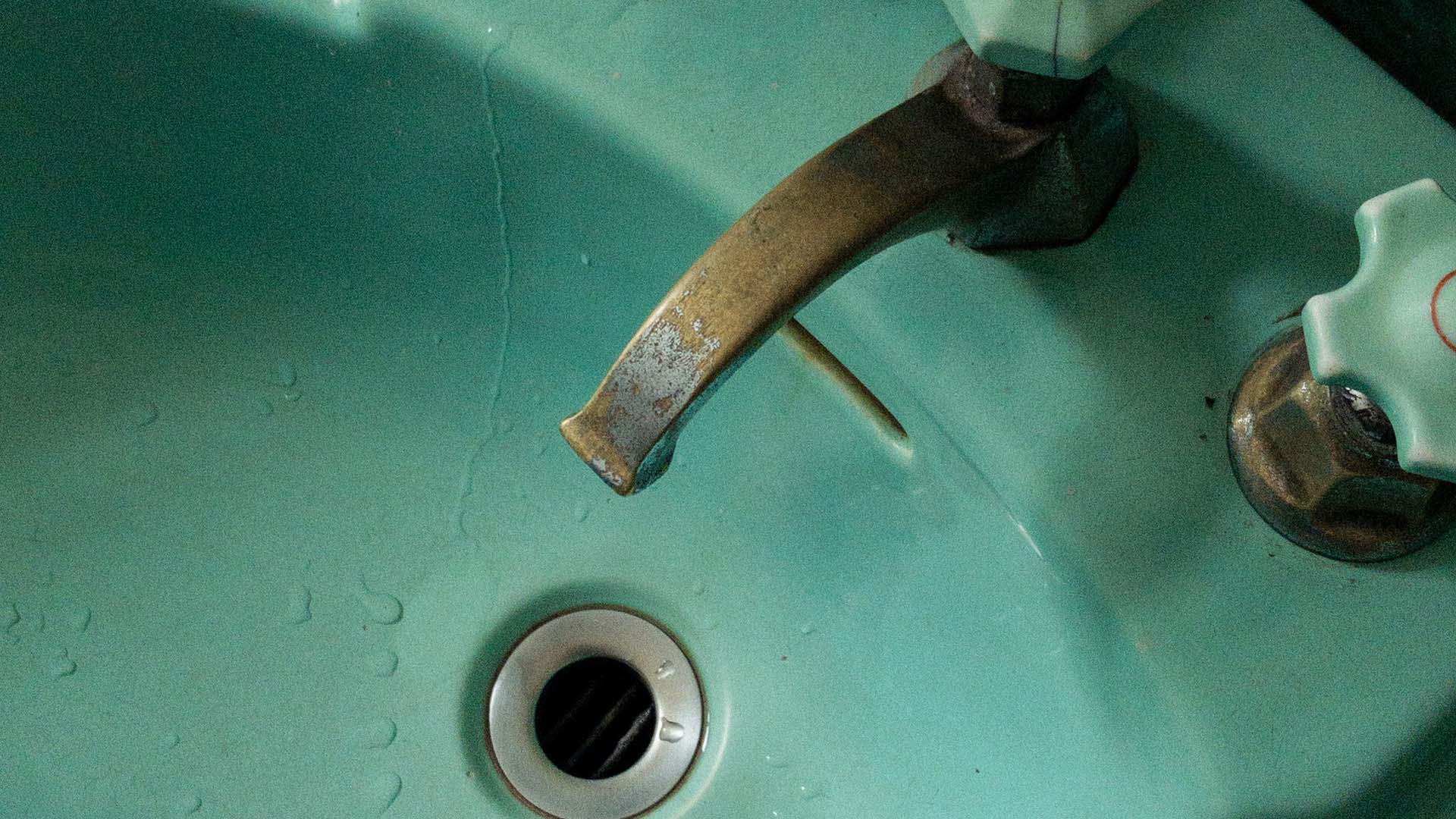 Facet over green sink