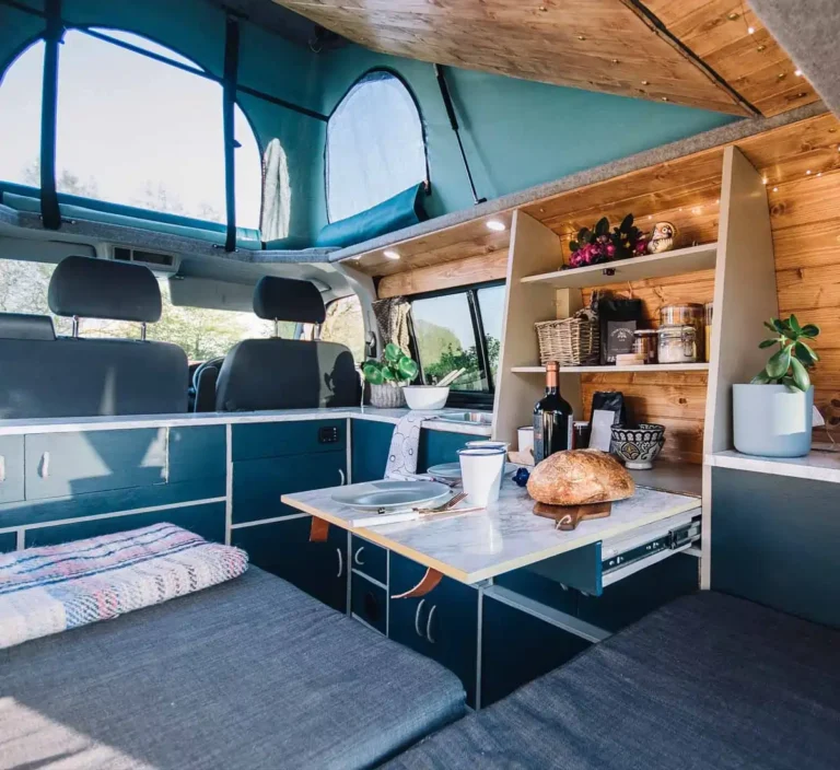 kitchenette in RV with loaf of bread on table