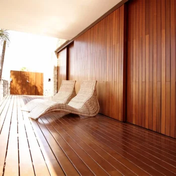lounge chairs in wood-paneled breezeway