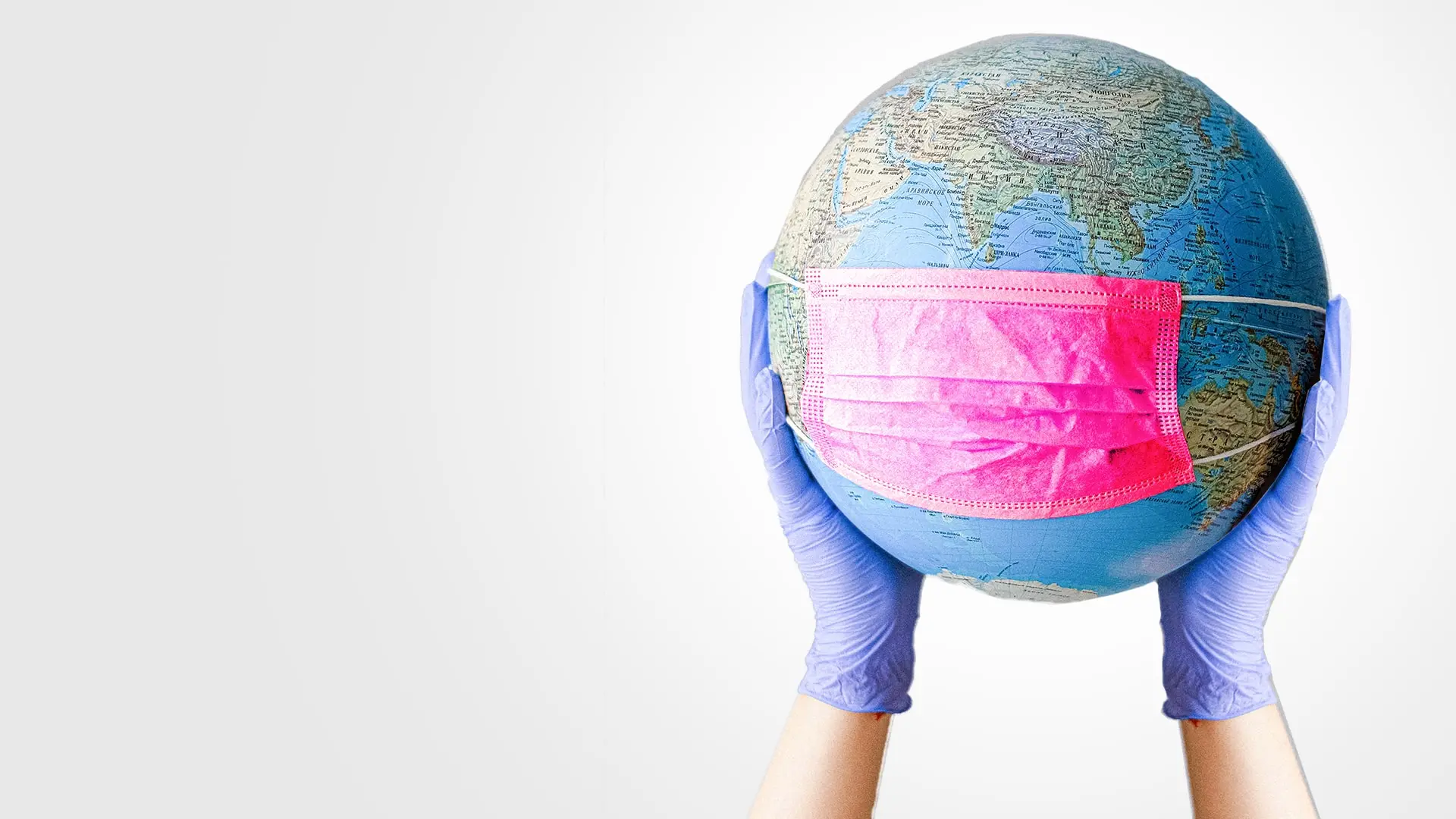globe wearing a surgical mask