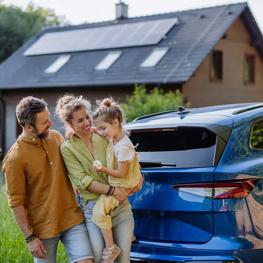 Family charging their car at home.