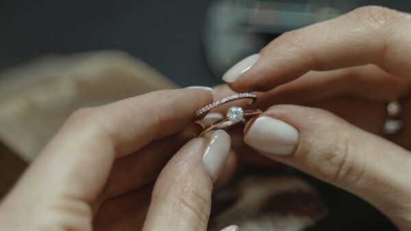 Close up of hand holding a ring