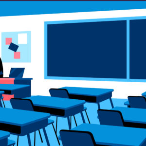 Tutor in classroom preparing lessons