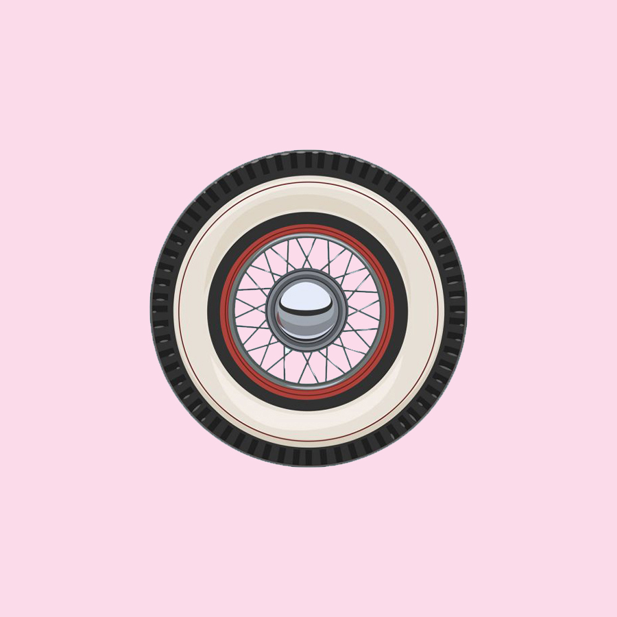 Classic car wheel on a pink background