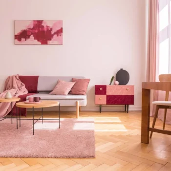 Modern pink condo living space in condo.
