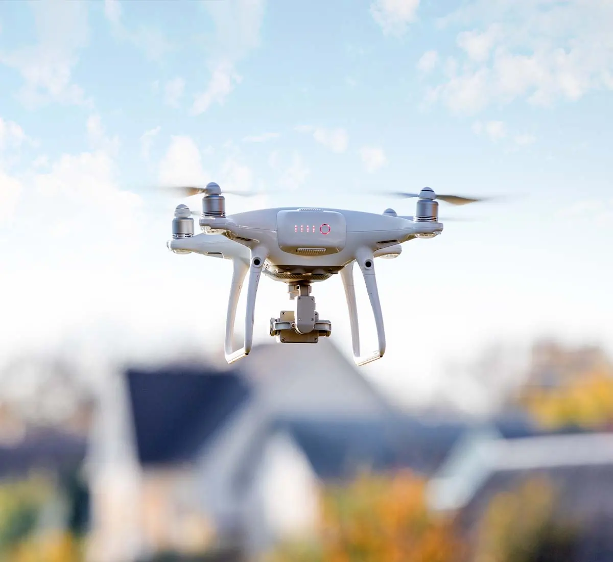 Sleek drone flying around a residential neighbourhood.