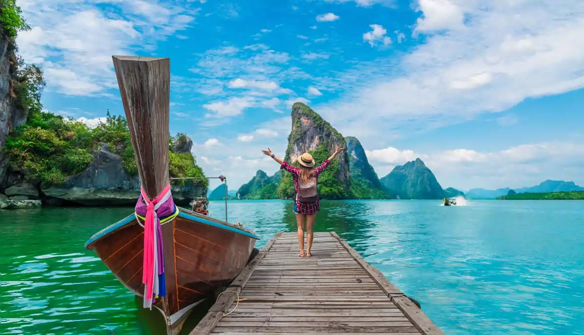 Tourist on a deck at Phang-Nga bay in Thailand.