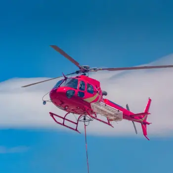 Fire fighting helicopter responding to wildfire.